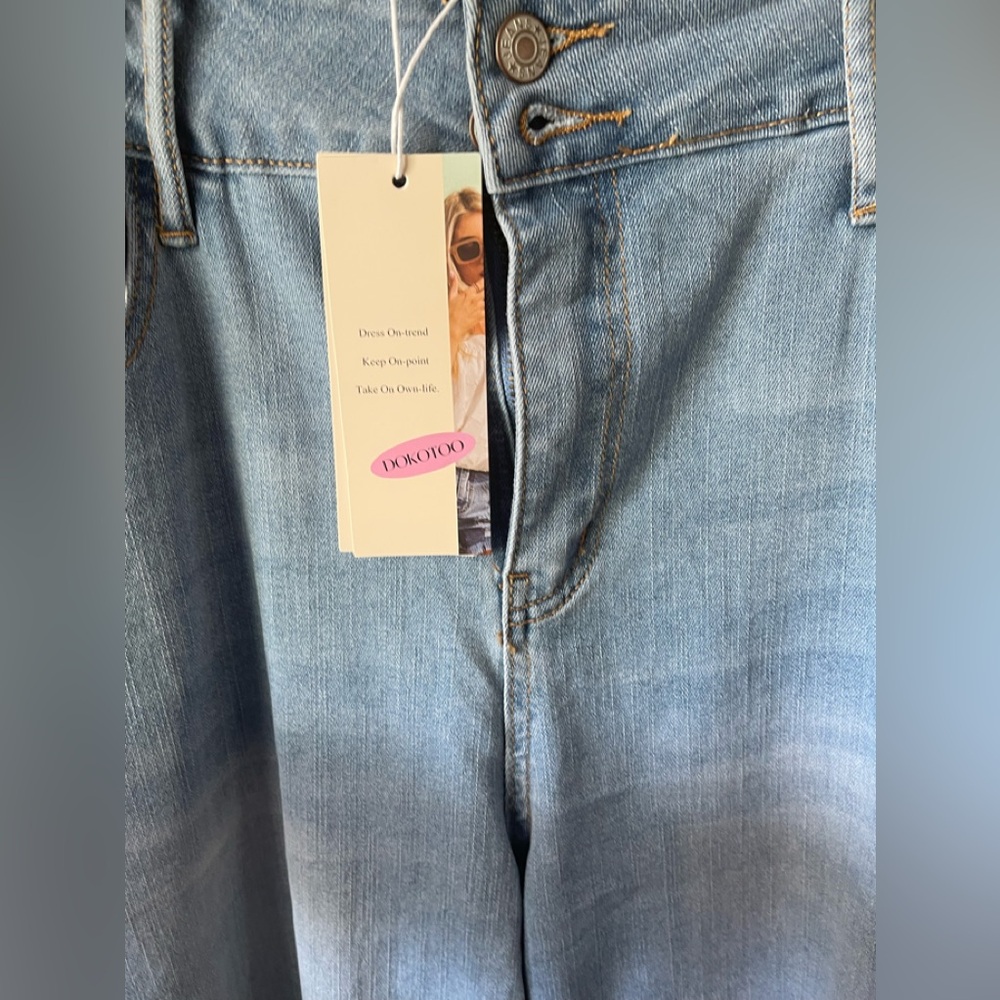 Flared, ankle, denim jeans, size 16. Never worn, with tag.